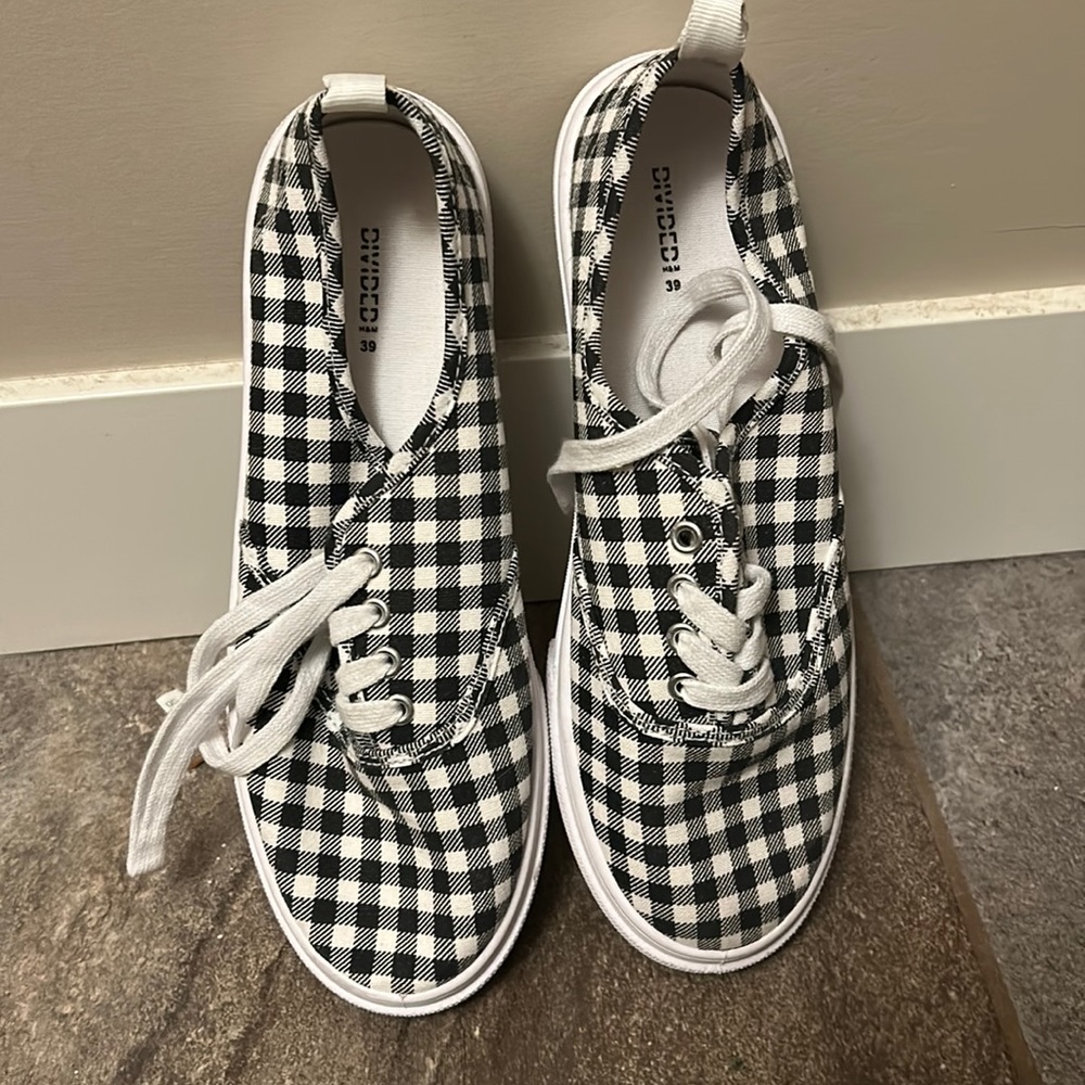 Black and white striped vans